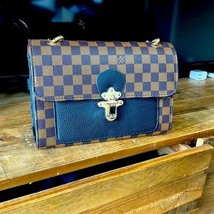 Used NOT REAL LV purse